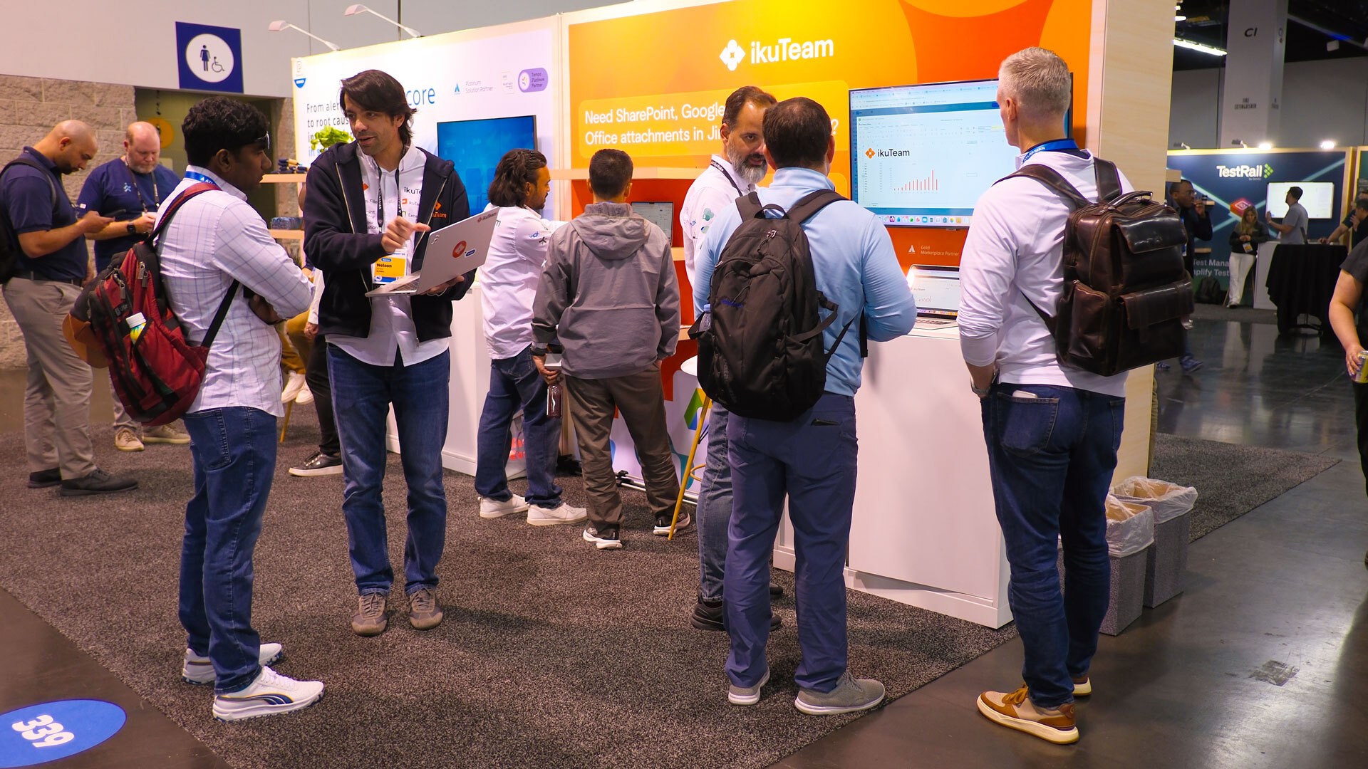 The ikuTeam crew solving file-management friction for Atlassian customers on the Expo floor.