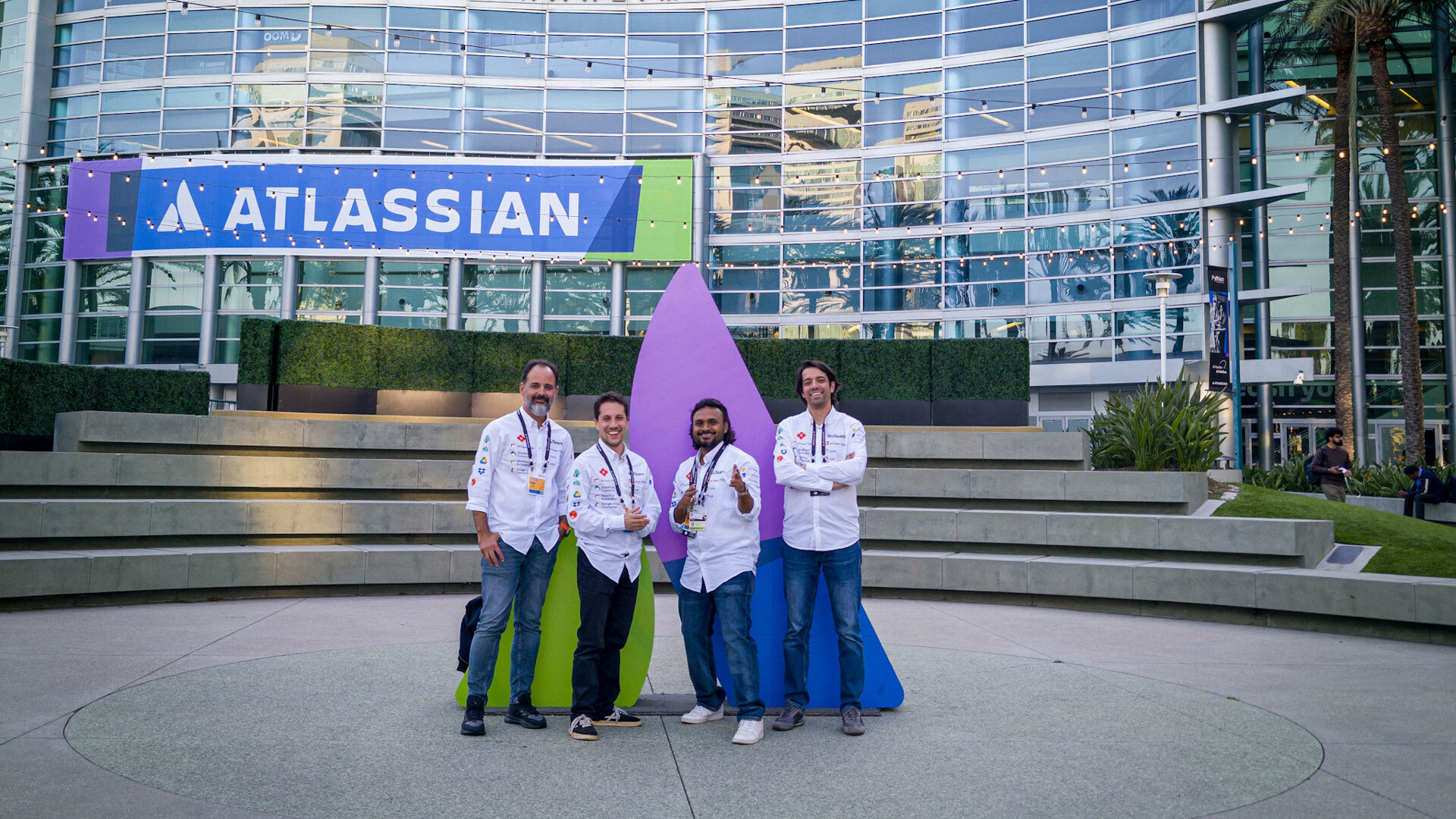 The ikuTeam crew outside the Anaheim Convention Center after a high-energy week at Atlassian Team '26.